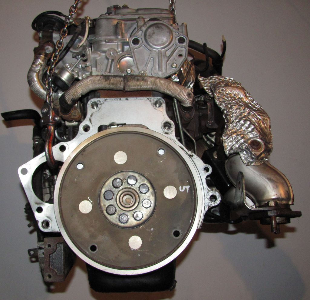 Mazda rf. Двигатель Mazda RF. Мазда мотор RF зажигания. Двигатель Мазда Атенза 2003 rf3m4g6015am. Мазда мотор LF-208262.