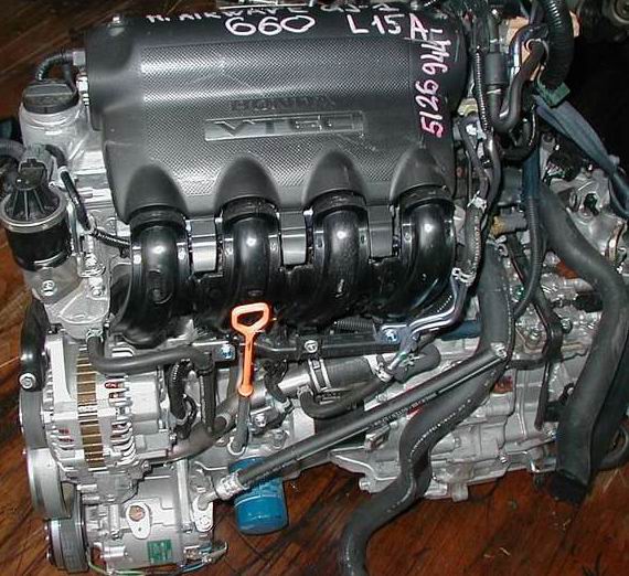 Двигатель фит 1.5. Мотор l15a Хонда. Honda Fit двигатель 1.5. Двигатель Хонда фит 1.3. Мотор Хонда фит 1.5.